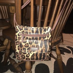 Cheetah print over the shoulder bag!